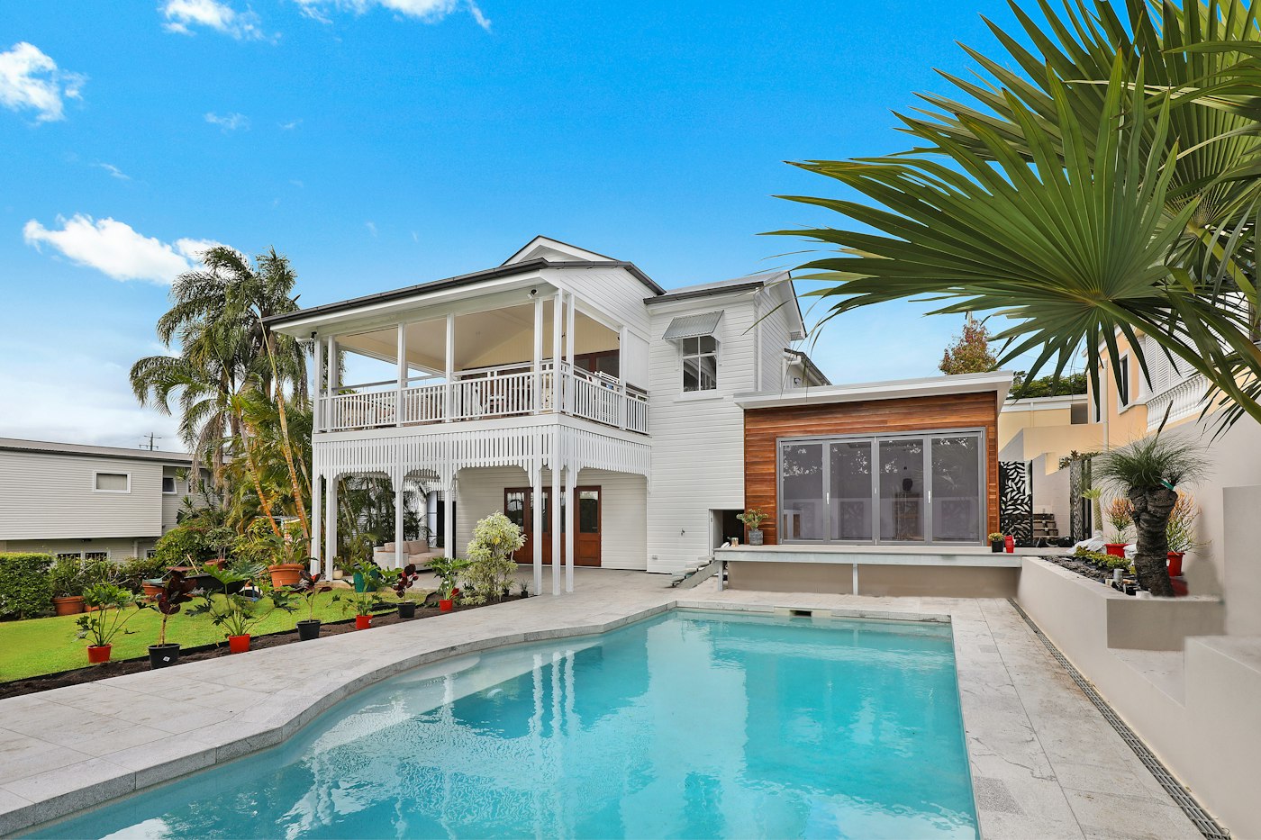Sunlit family house with a front garden